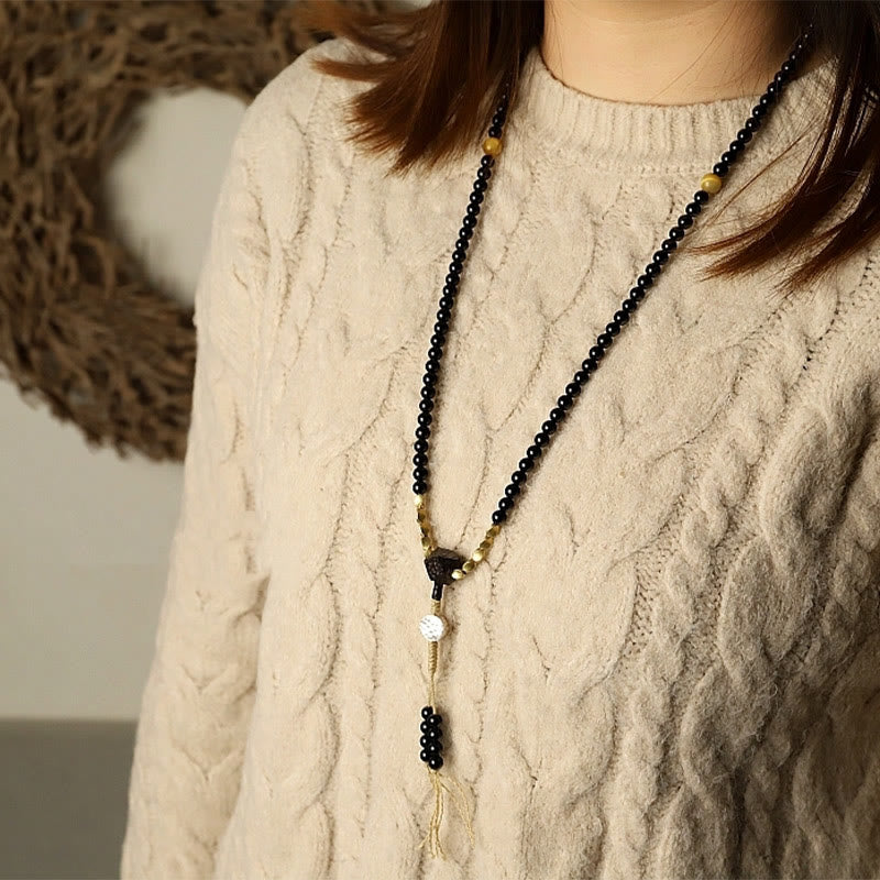 Mala-Armband mit 108 Perlen aus schwarzem Onyx und Schutzedelstein