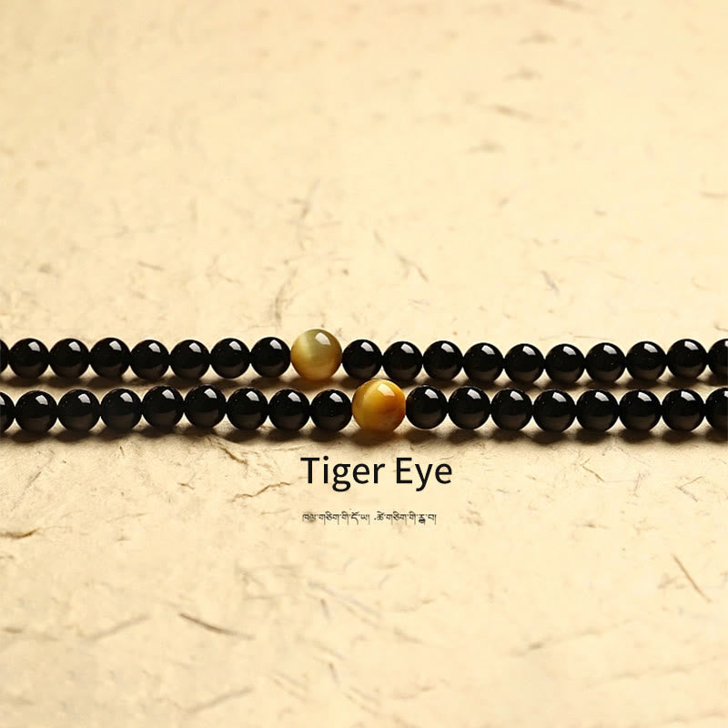Mala-Armband mit 108 Perlen aus schwarzem Onyx und Schutzedelstein