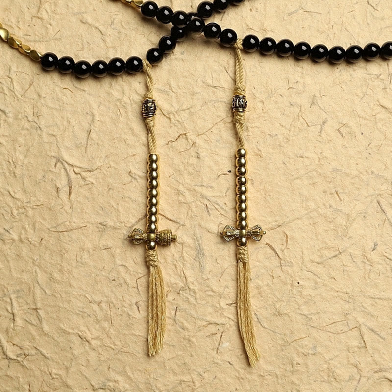 Mala-Armband mit 108 Perlen aus schwarzem Onyx und Schutzedelstein