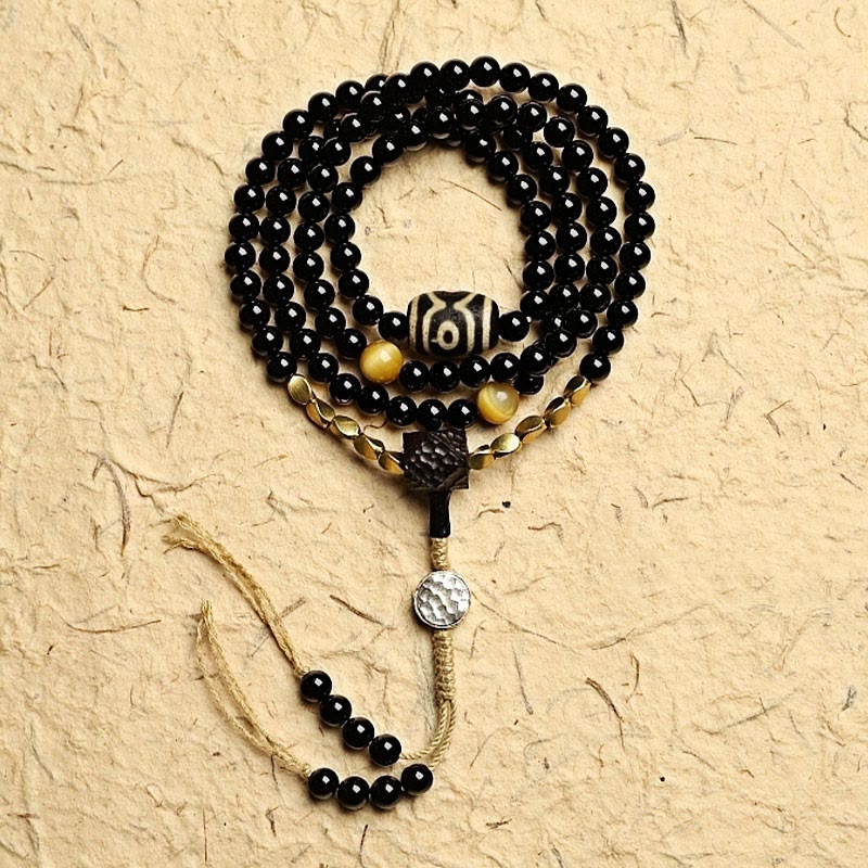 Mala-Armband mit 108 Perlen aus schwarzem Onyx und Schutzedelstein