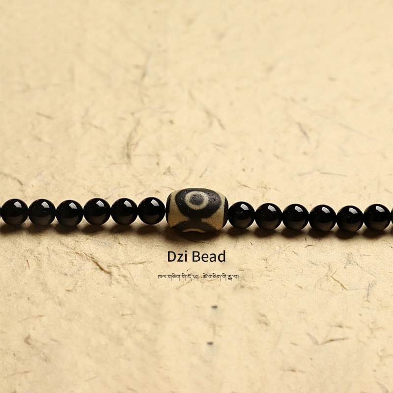Mala-Armband mit 108 Perlen aus schwarzem Onyx und Schutzedelstein