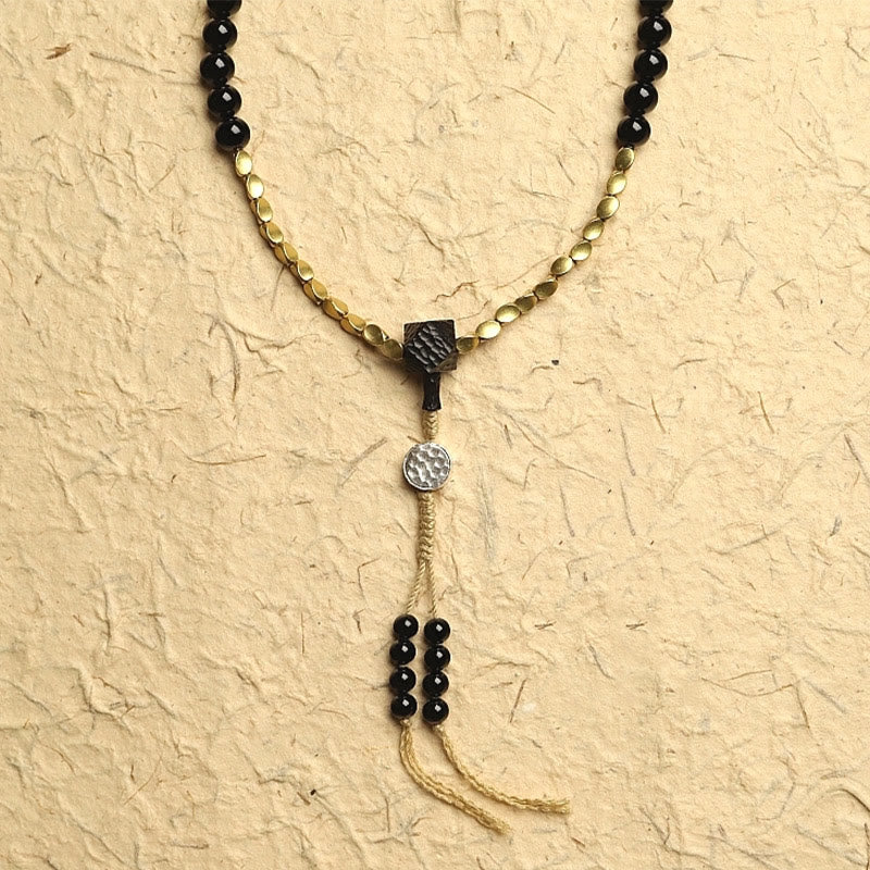 Mala-Armband mit 108 Perlen aus schwarzem Onyx und Schutzedelstein