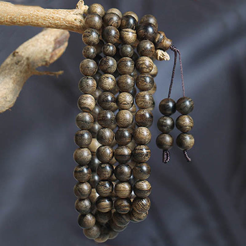 108 Perlen Tarakan Agarwood Holz Mala Armband zum Schutz