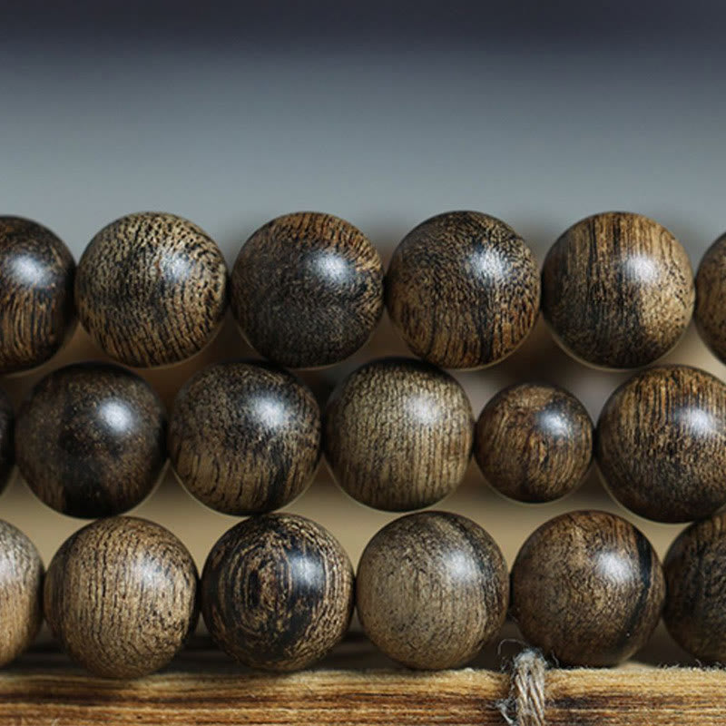 108 Perlen Tarakan Agarwood Holz Mala Armband zum Schutz