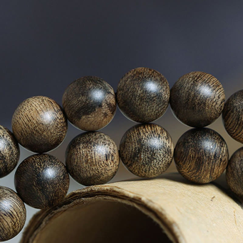 108 Perlen Tarakan Agarwood Holz Mala Armband zum Schutz