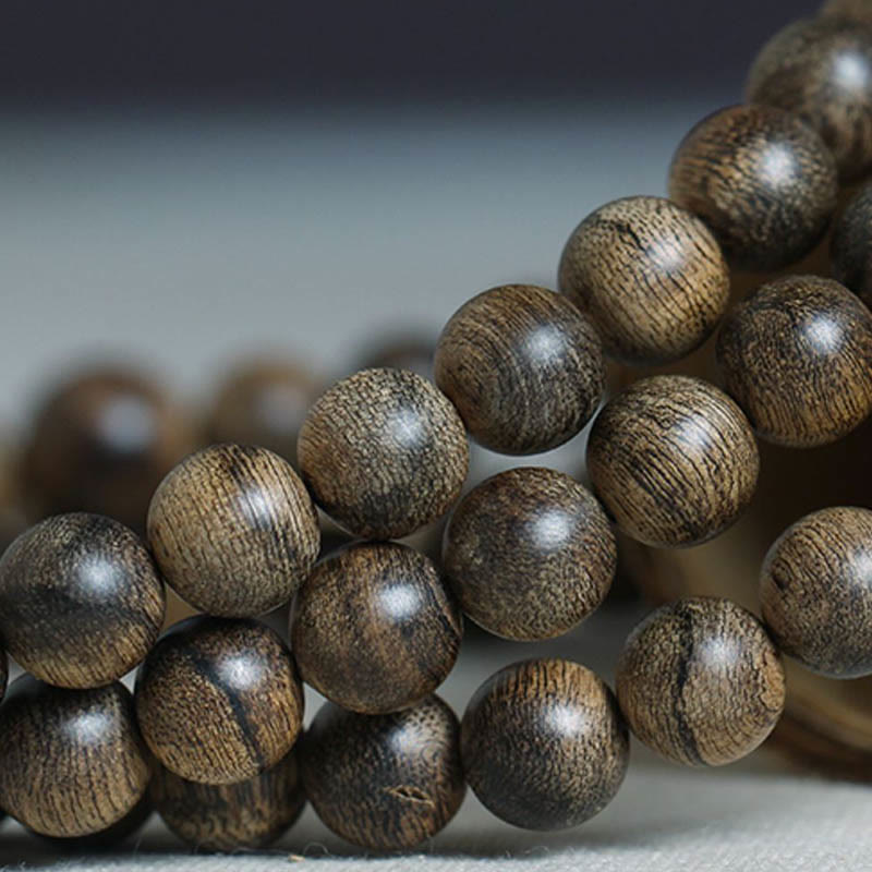 108 Perlen Tarakan Agarwood Holz Mala Armband zum Schutz