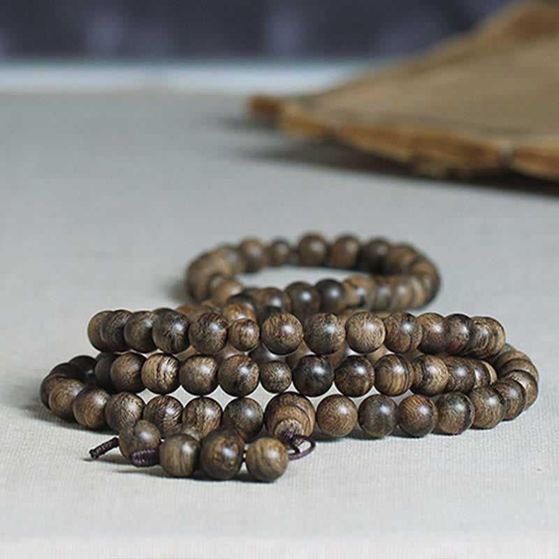 108 Perlen Tarakan Agarwood Holz Mala Armband zum Schutz