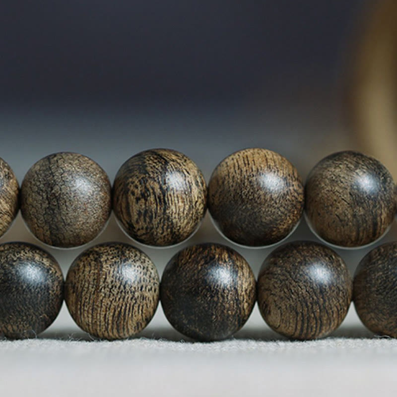 108 Perlen Tarakan Agarwood Holz Mala Armband zum Schutz