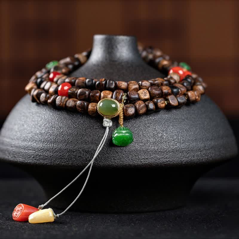 108 Mala-Perlen Adlerholz-Armband für Frieden und Stärke