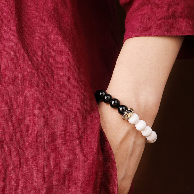 10 mm schwarzes Obsidian-Yin-Yang-Stärkearmband