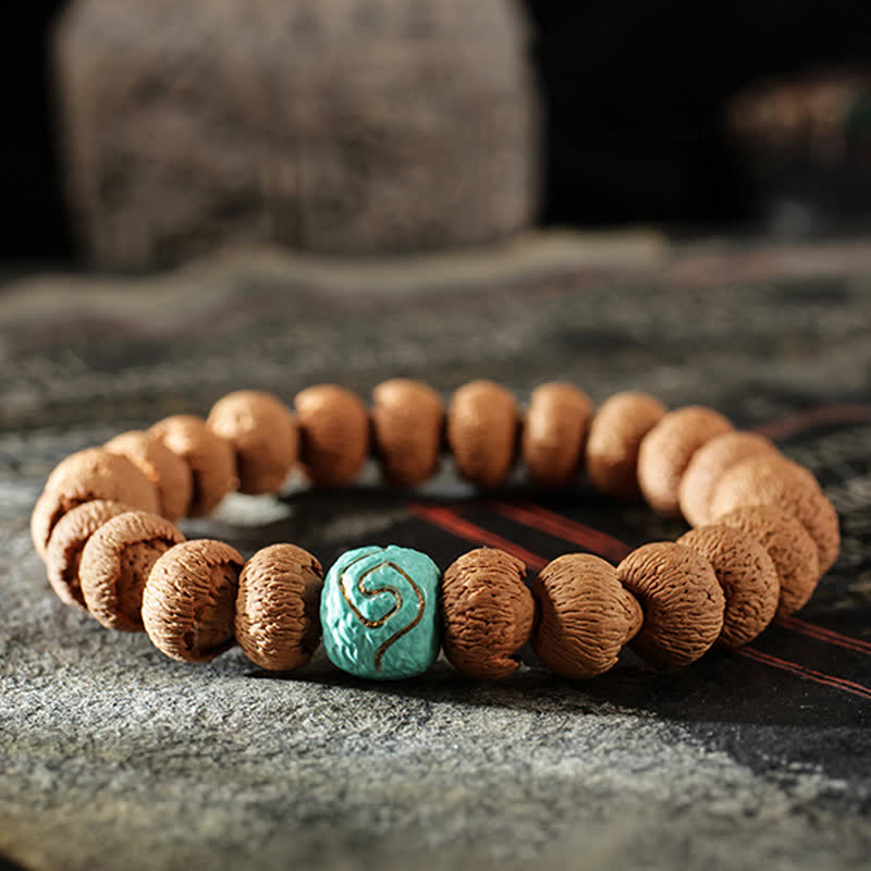 10 mm Bodhi-Samen-Schutzarmband aus Türkis und Bernstein