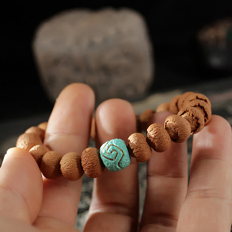 10 mm Bodhi-Samen-Schutzarmband aus Türkis und Bernstein