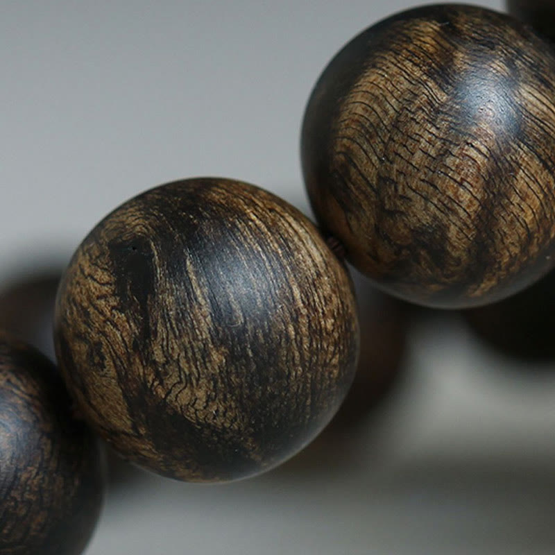 10 mm Brunei Agarwood Wasserwellen-Friedensarmband