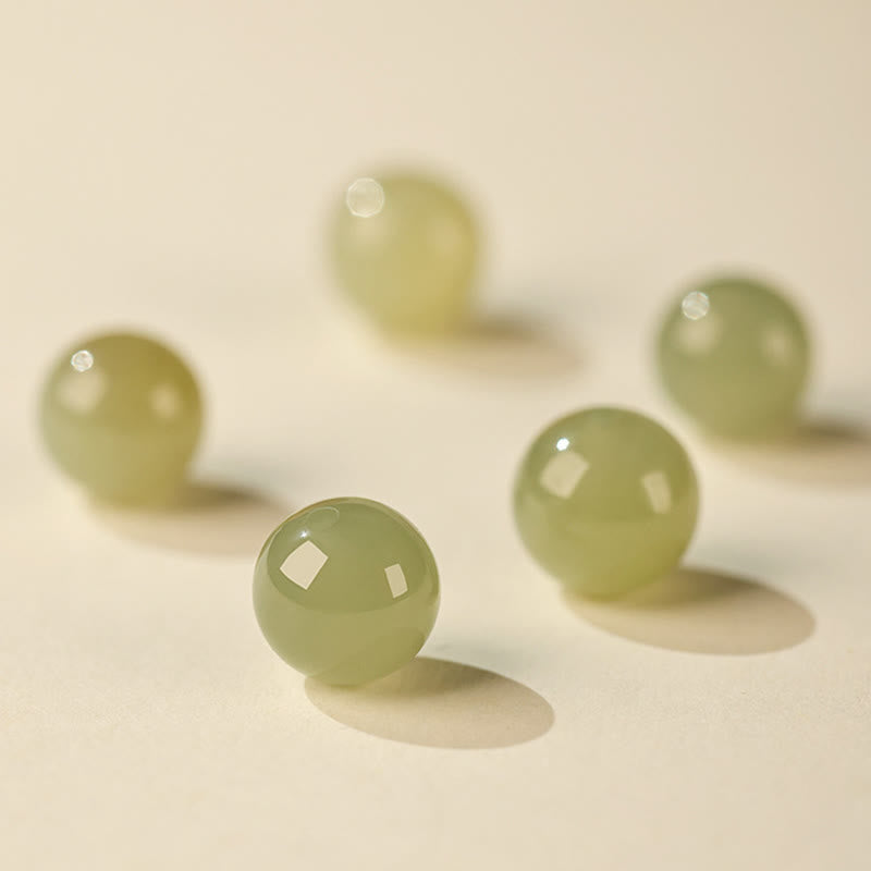 10 mm geflochtenes Glücksarmband aus Hetian-Jade für spirituelles Gleichgewicht