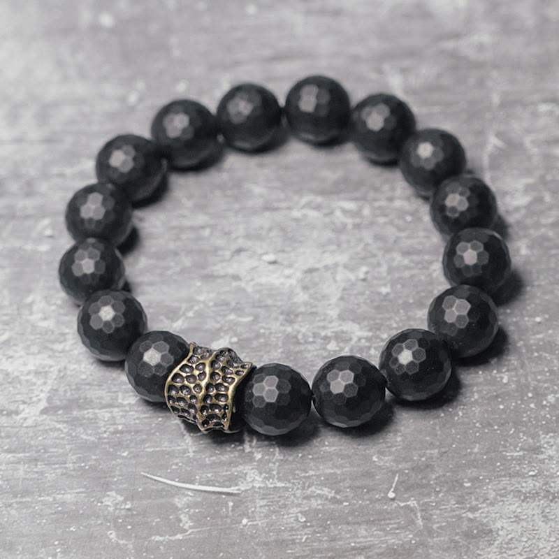12 mm schwarzes Onyx-Schutzarmband mit Kupferakzent | Heilende Klänge