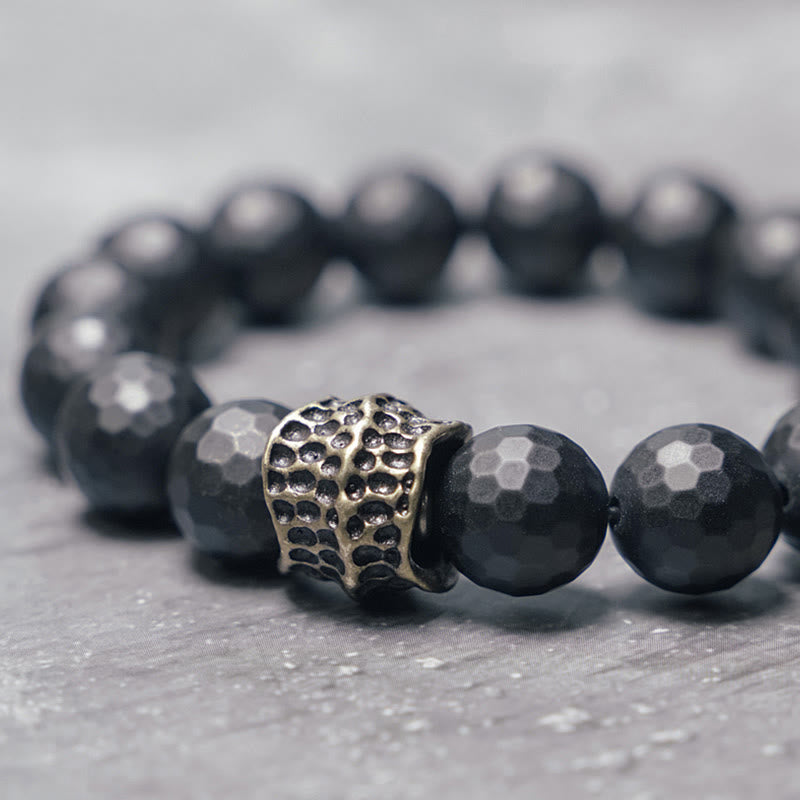 12 mm schwarzes Onyx-Schutzarmband mit Kupferakzent | Heilende Klänge