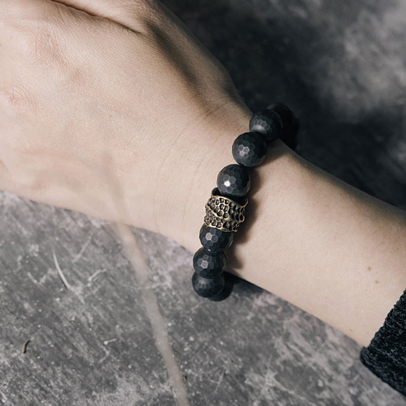 12 mm schwarzes Onyx-Schutzarmband mit Kupferakzent | Heilende Klänge
