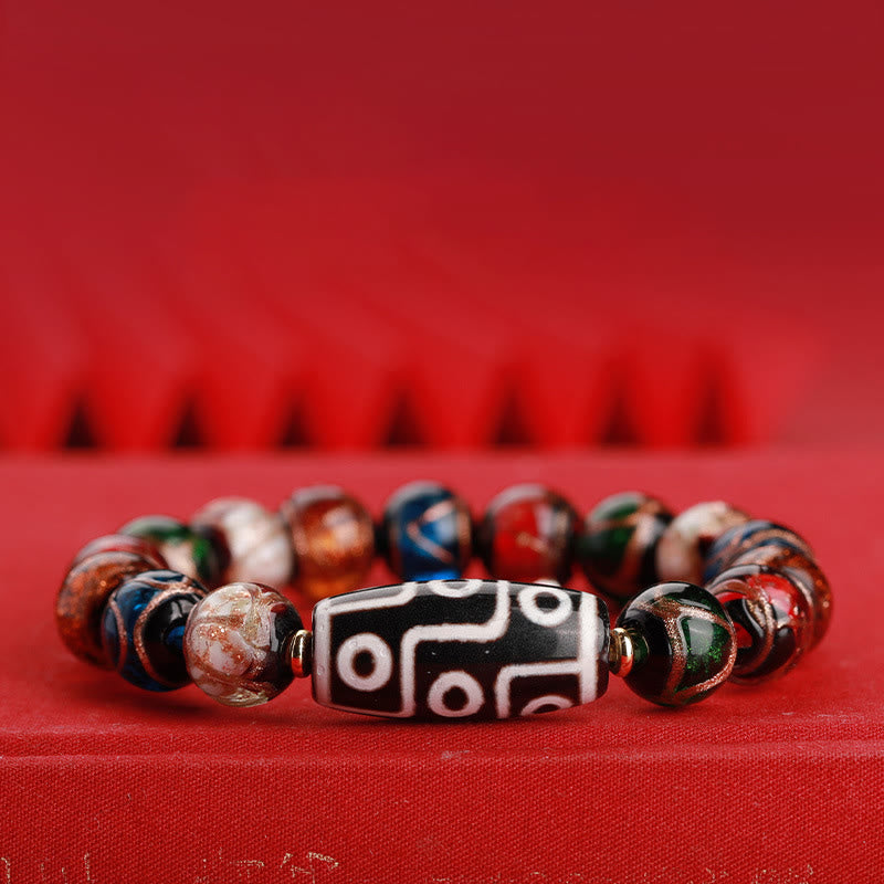 12 mm Neun-Augen-Dzi-Perlenarmband mit spirituellem Reichtum