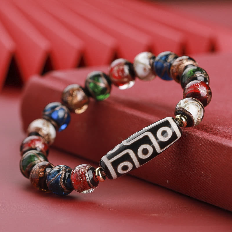 12 mm Neun-Augen-Dzi-Perlenarmband mit spirituellem Reichtum