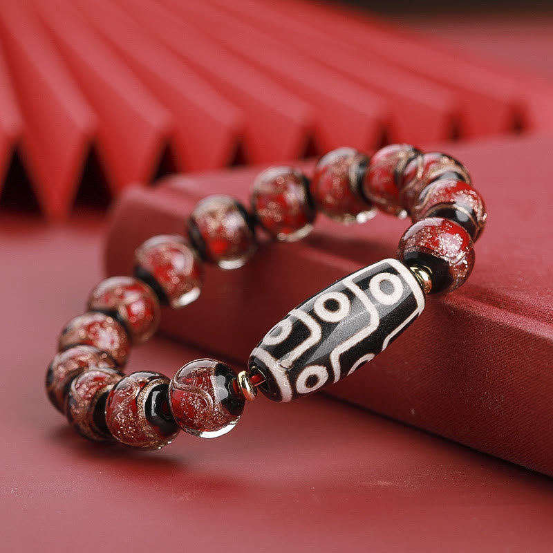 12 mm Neun-Augen-Dzi-Perlenarmband mit spirituellem Reichtum