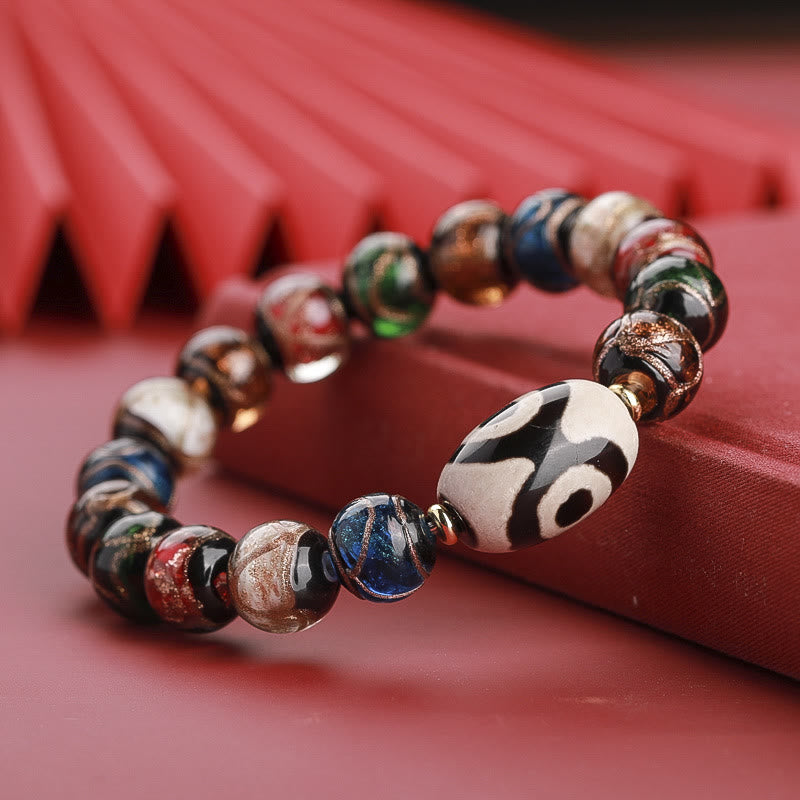 12 mm Neun-Augen-Dzi-Perlenarmband mit spirituellem Reichtum
