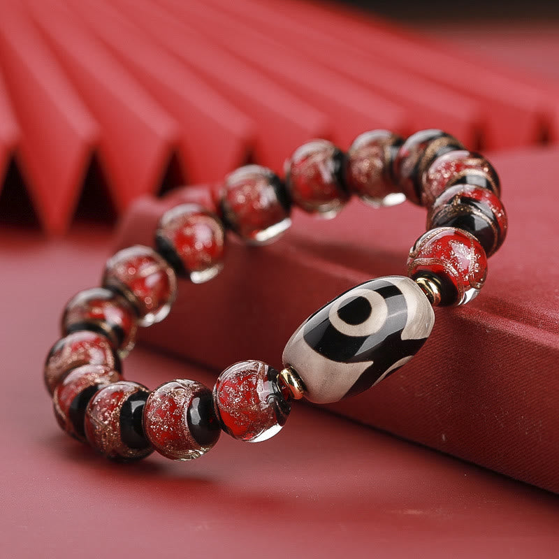 12 mm Neun-Augen-Dzi-Perlenarmband mit spirituellem Reichtum