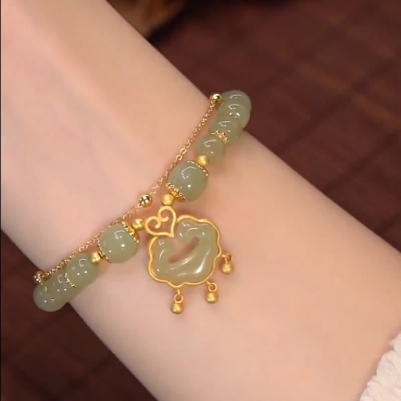 14 Karat vergoldetes Hetian-Jade-Wunschschloss-Glockenkettenarmband