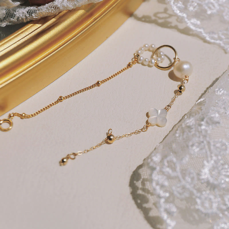 14 Karat vergoldetes Perlenarmband mit doppelter Peace-Schnalle