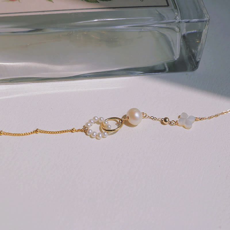 14 Karat vergoldetes Perlenarmband mit doppelter Peace-Schnalle