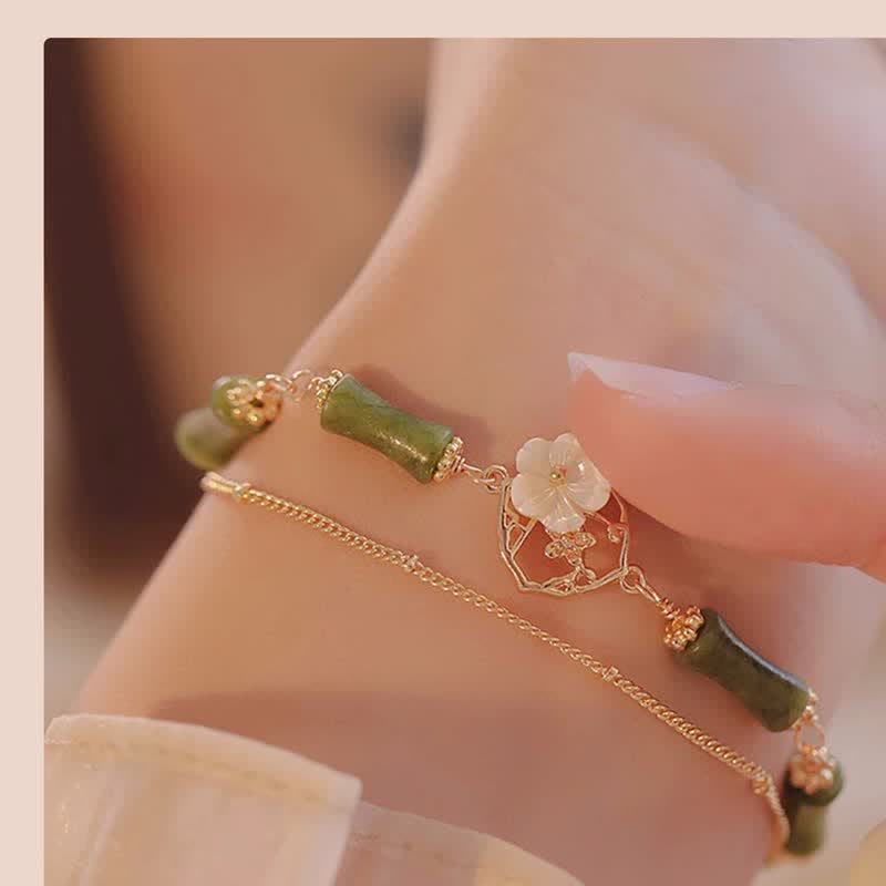 14 Karat vergoldetes spirituelles Peridot-Armband mit Bambusblüte