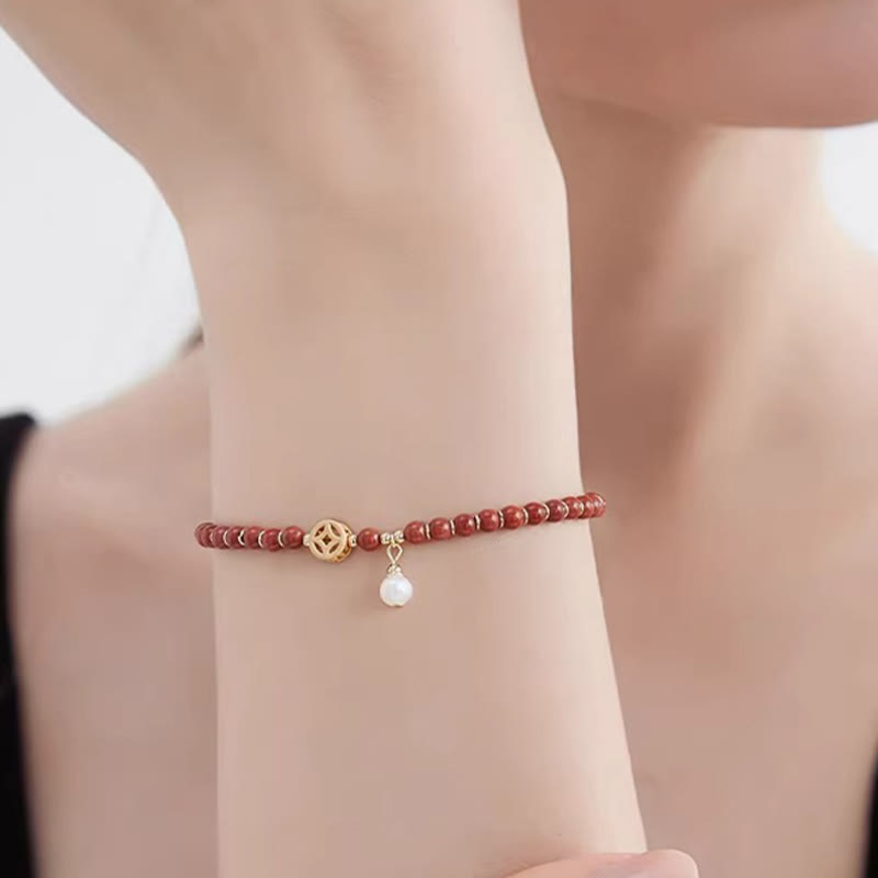 14 Karat vergoldetes Vertrauensarmband aus rotem Achat mit Kupfermünze