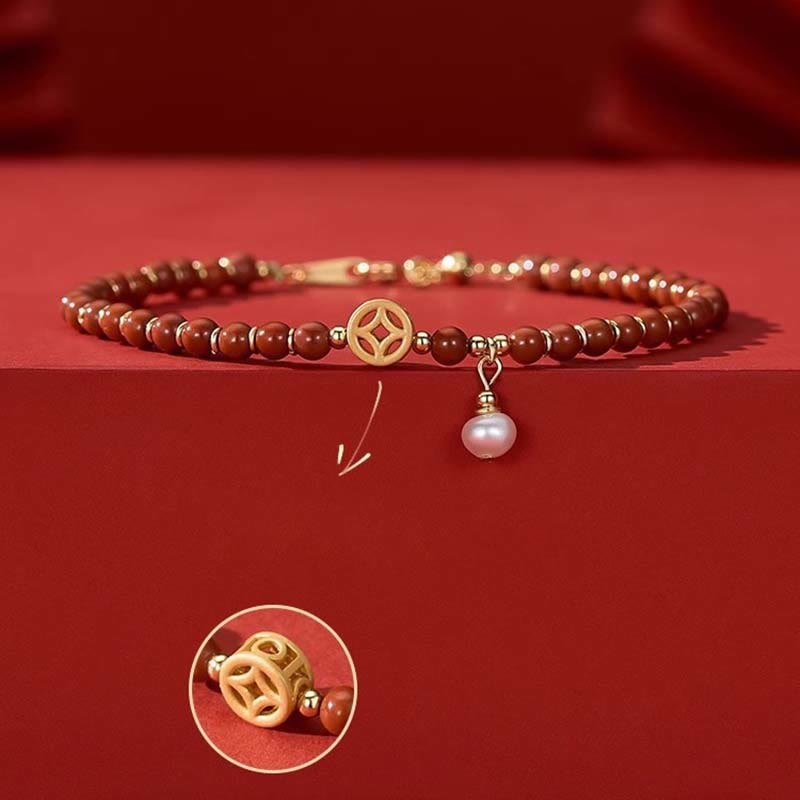 14 Karat vergoldetes Vertrauensarmband aus rotem Achat mit Kupfermünze