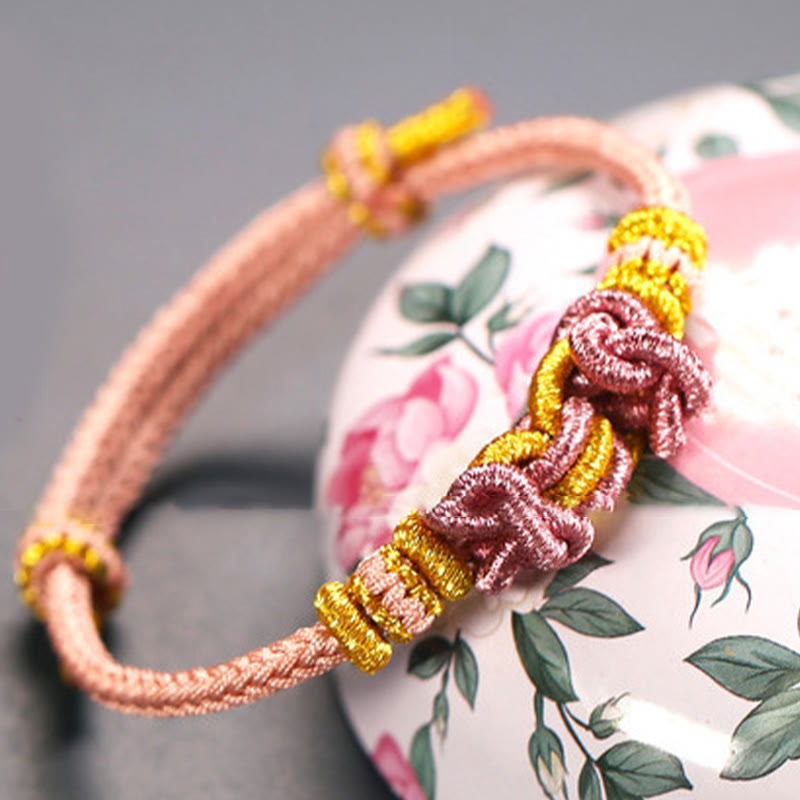 Unisex Red String Saddle Knot Strength Bracelet
