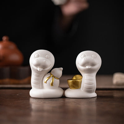 Keramikfigur aus Kürbis und Barren zum Jahr der Schlange