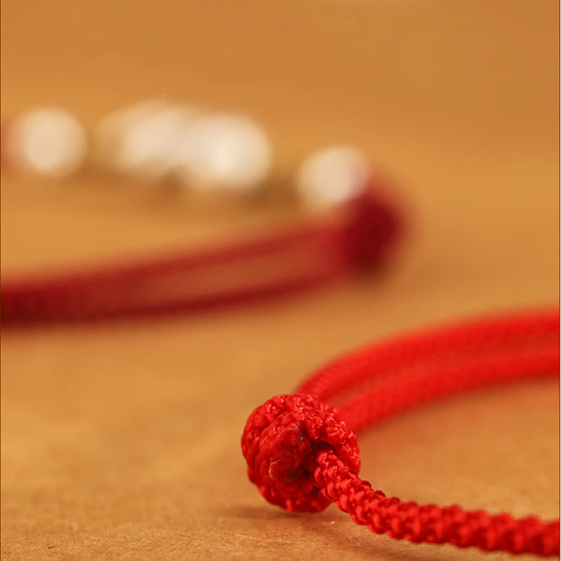 Fußkettchen mit Schlangenmotiv aus Sterlingsilber mit roter Schnur
