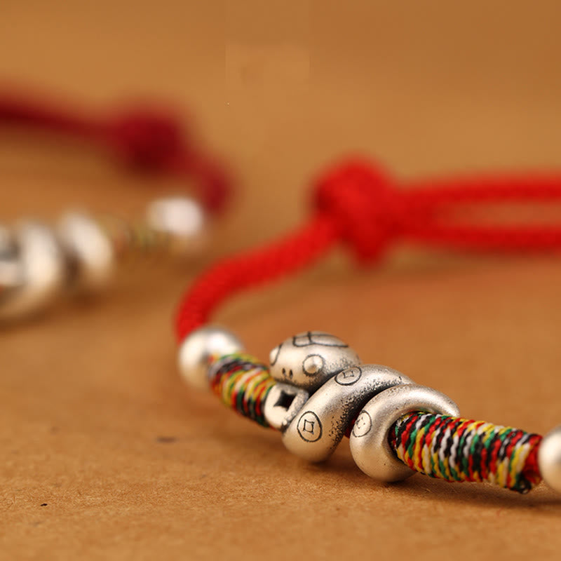 Fußkettchen mit Schlangenmotiv aus Sterlingsilber mit roter Schnur