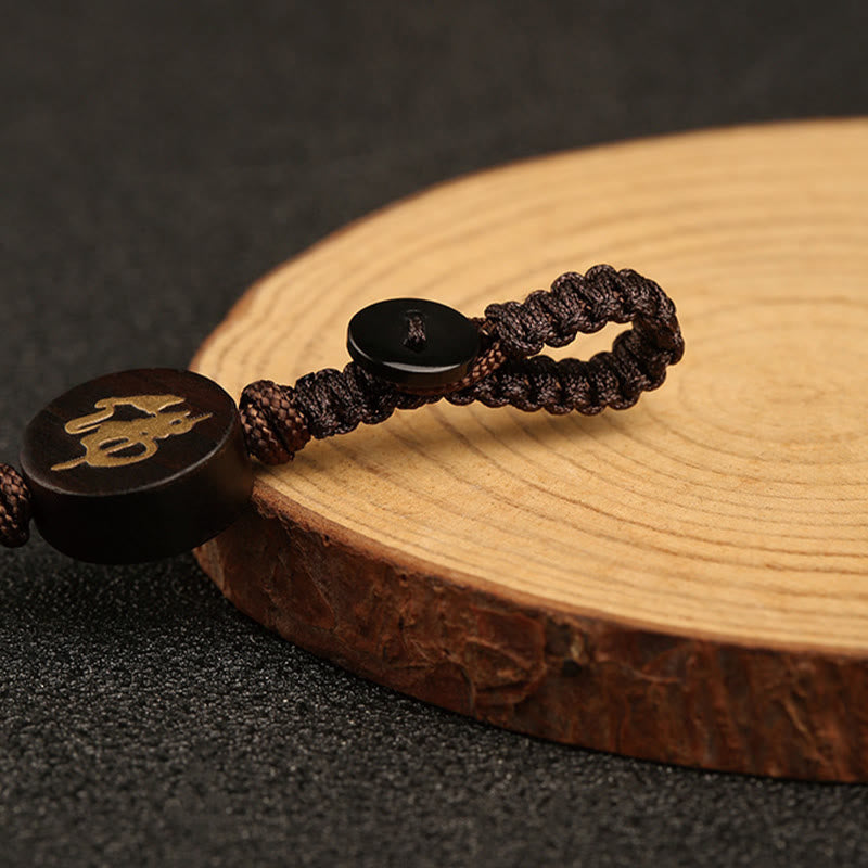 Schlüsselanhänger mit Buddha-Schutz aus rotem Sandelholz, kleinem Blatt