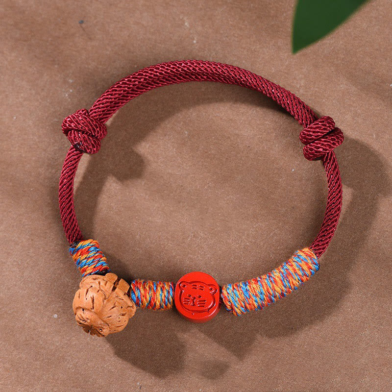 Chinese Zodiac Red String Peach Pit Cinnabar Luck Bracelet