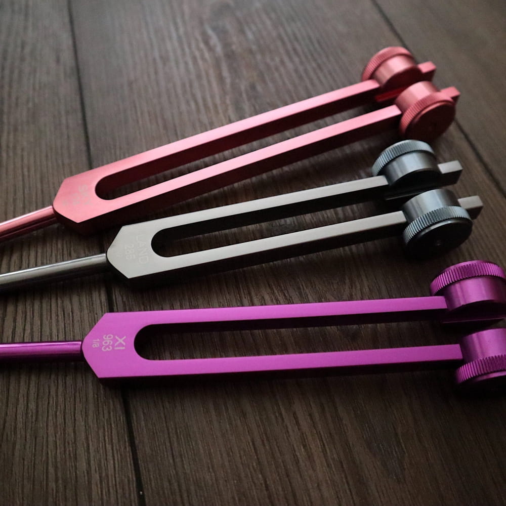 Colorful Tuning Forks in Pink, Silver, and Purple from 18pc Solfeggio & Chakra Set