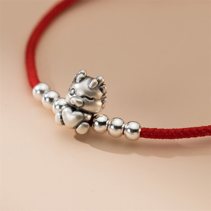 23 cm großes Sterlingsilber-Armband mit Drachenglück und roter Schnur