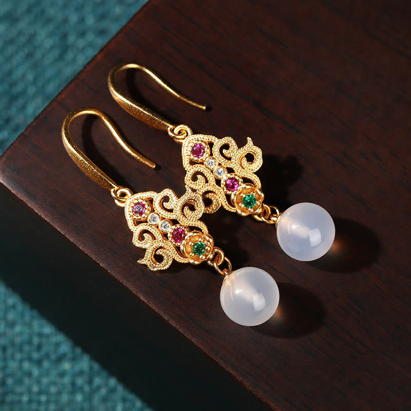 Spirituelle Ohrringe aus 24 Karat vergoldetem Chalcedon