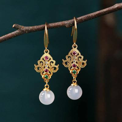 Spirituelle Ohrringe aus 24 Karat vergoldetem Chalcedon