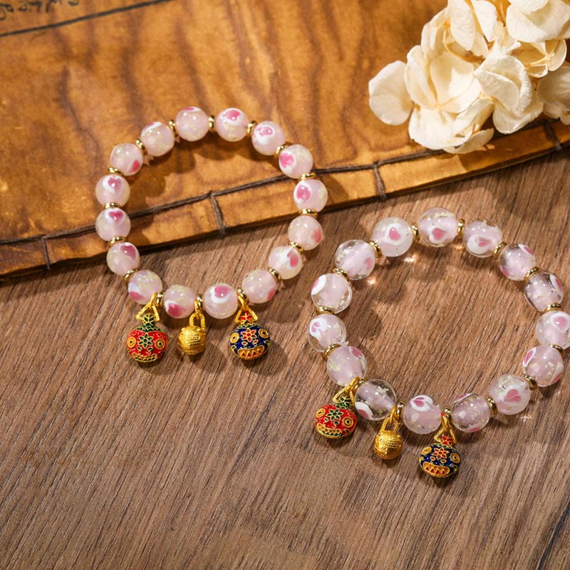 Luminous Pink Love Heart Spiritual Bracelet with Gold Swallowing Beast