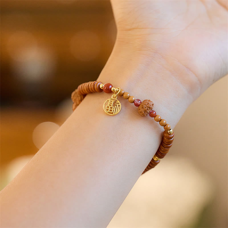 Om Mani Padme Hum Armband Bodhi Seed und schwarzer Onyx