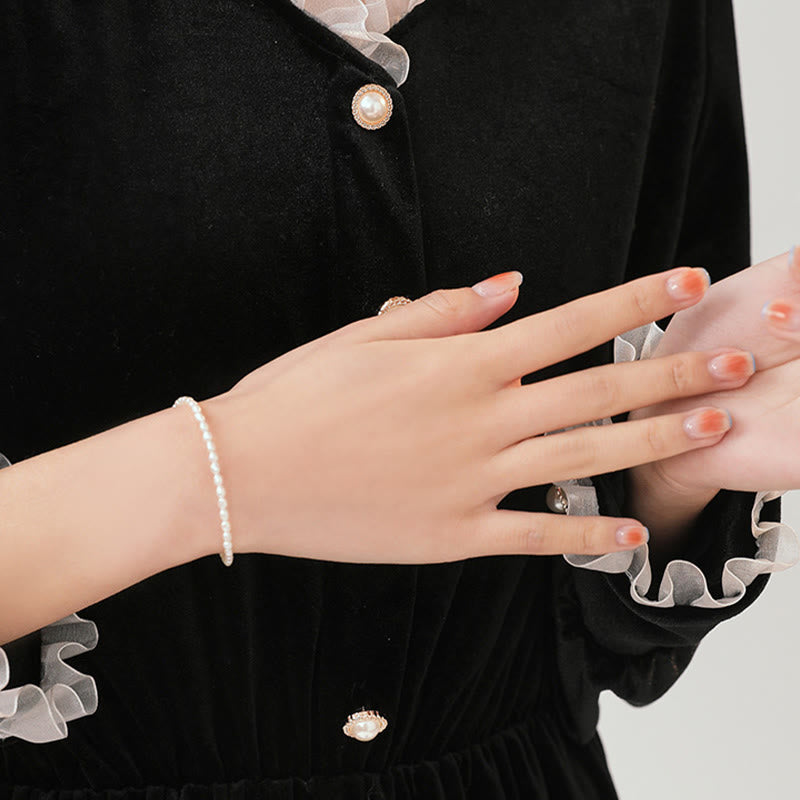 2 mm Naturperle &amp; 14 Karat vergoldetes Weisheitsarmband