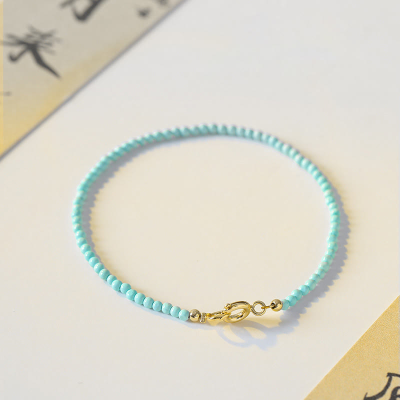 2 mm Türkis &amp; 14 Karat Gold Weisheitsarmband