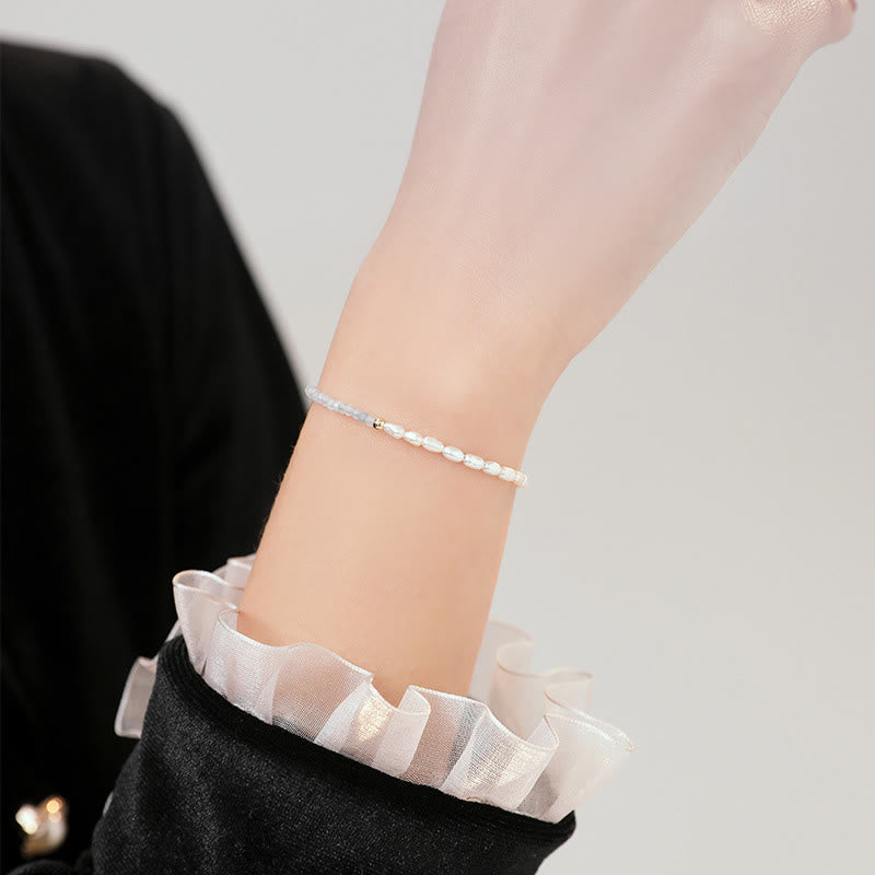 2 mm türkisfarbenes Perlenarmband mit Weisheit