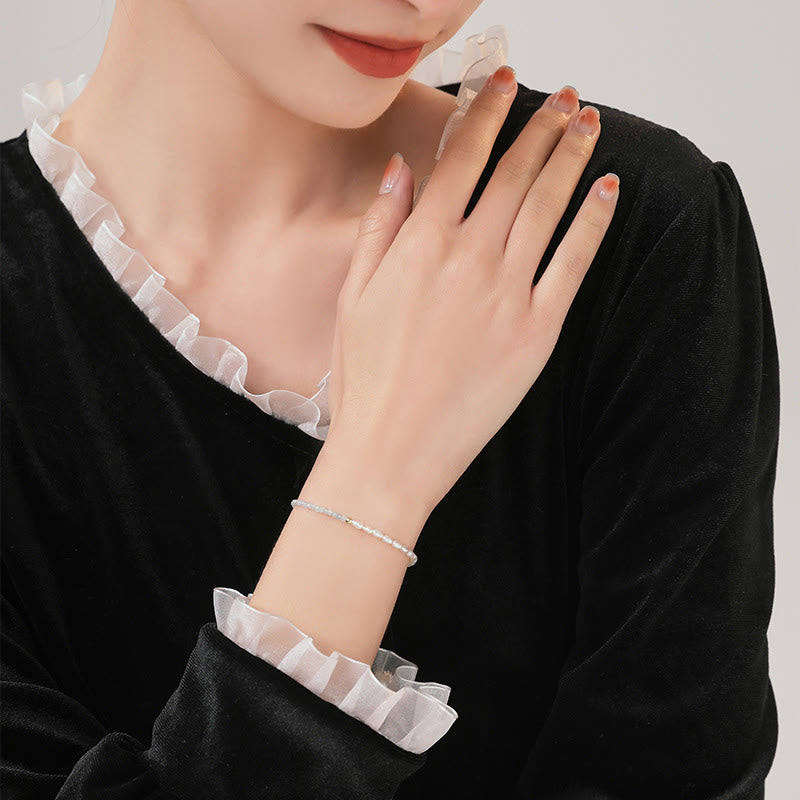 2 mm türkisfarbenes Perlenarmband mit Weisheit