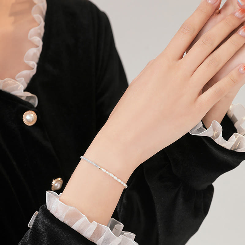 2 mm türkisfarbenes Perlenarmband mit Weisheit