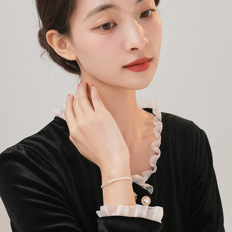 2 mm türkisfarbenes Perlenarmband mit Weisheit